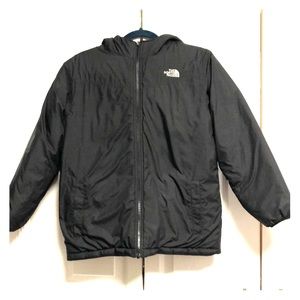 The North Face. Black reversible coat with hood.
